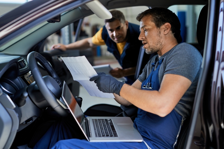 Massy Inspector checking a car